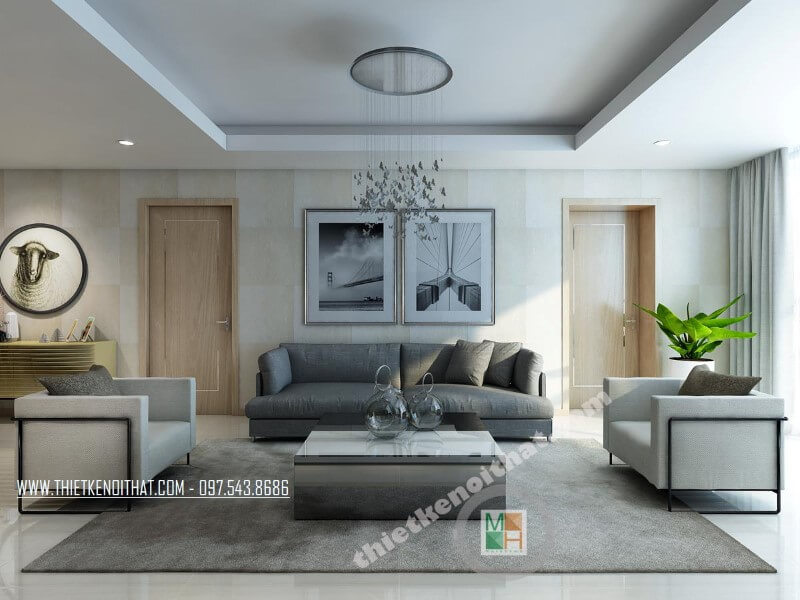 Mẫu thiết kế phòng khách chung cư sang trọng với bộ sofa bọc vài màu xám và trắng tạo điểm nhấn nổi bật cho căn phòng. Gợi ý các mẫu thiết kế phòng khách ưa chuộng nhất hiện nay
