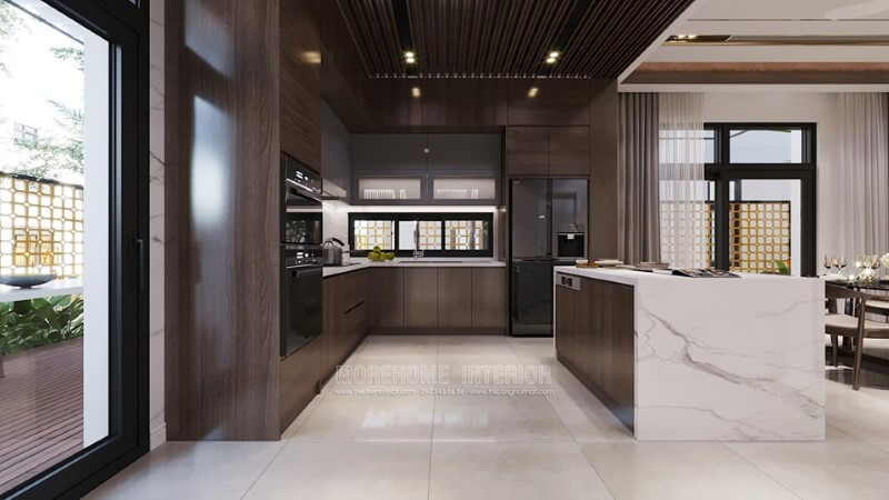 Nội thất phòng bếp được kết hợp giữa gỗ óc chó và đá ốp tự nhiên cao cấp tăng thêm sự sang trọng Thiết kế nội thất phòng bếp